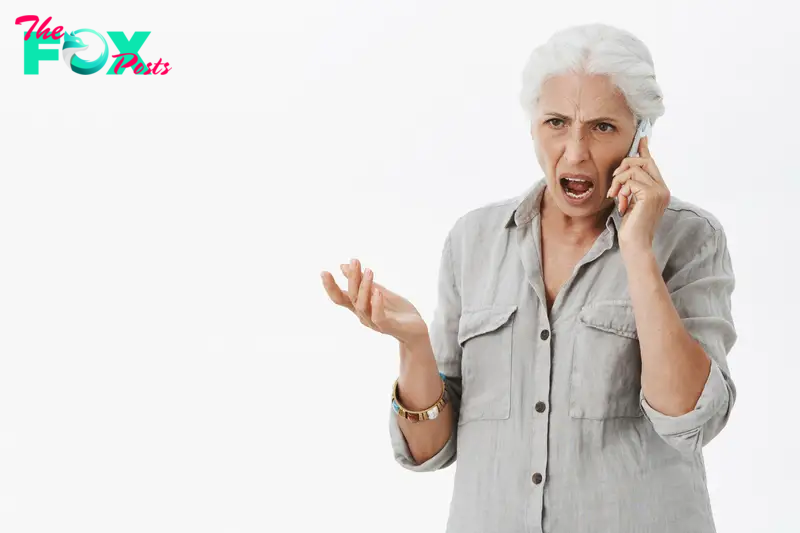 An upset woman talking on the phone | Source: Freepik