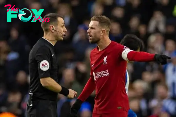 BRIGHTON & HOVE, ENGLAND - Sunday, January 29, 2023: Liverpool's captain Jordan Henderson speaks with referee David Coote after the FA Cup 4th Round match between Brighton & Hove Albion FC and Liverpool FC at the Falmer Stadium. Brighton won 2-1. (Pic by David Rawcliffe/Propaganda)