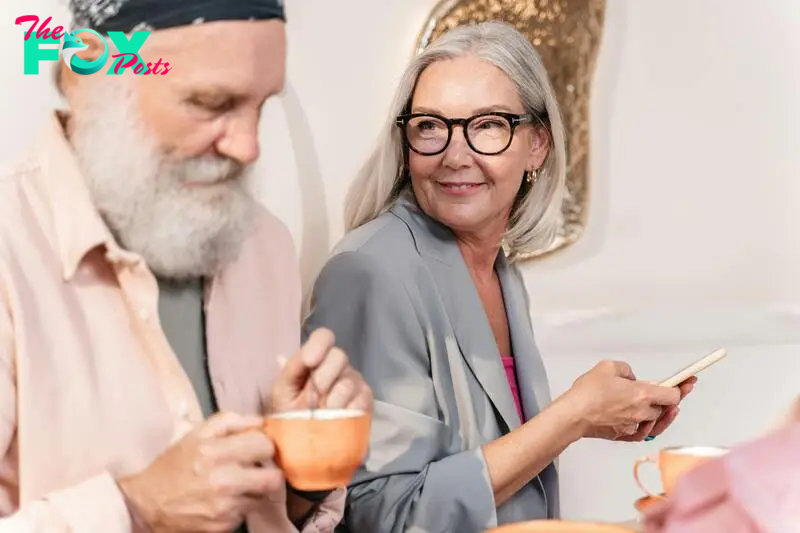 An elderly couple enjoying warm drinks | Source: Pexels