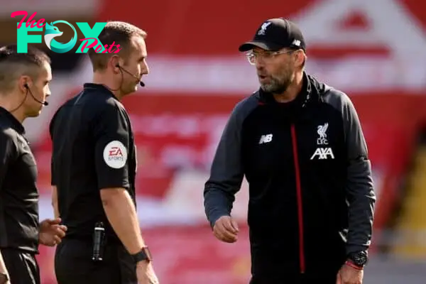 Liverpool's manager Jurgen Klopp (right) with match referee David Coote (centre) after the final whistle during the Premier League match at Anfield Stadium, Liverpool. PA Photo. Issue date: Saturday July 11, 2020. See PA story SOCCER Liverpool. Photo credit should read: Oli Scarff/NMC Pool/PA Wire. RESTRICTIONS: EDITORIAL USE ONLY No use with unauthorised audio, video, data, fixture lists, club/league logos or "live" services. Online in-match use limited to 120 images, no video emulation. No use in betting, games or single club/league/player publications.