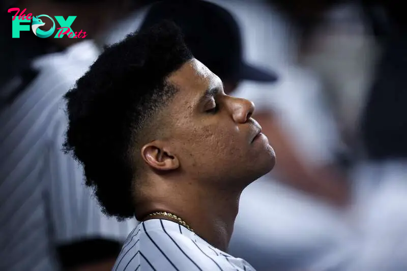 NEW YORK, NEW YORK - SEPTEMBER 10: Juan Soto #22 of the New York Yankees looks no from the dugout during the ninth inning of the game against the Kansas City Royals at Yankee Stadium on September 10, 2024 in New York City.   Dustin Satloff/Getty Images/AFP (Photo by Dustin Satloff / GETTY IMAGES NORTH AMERICA / Getty Images via AFP)