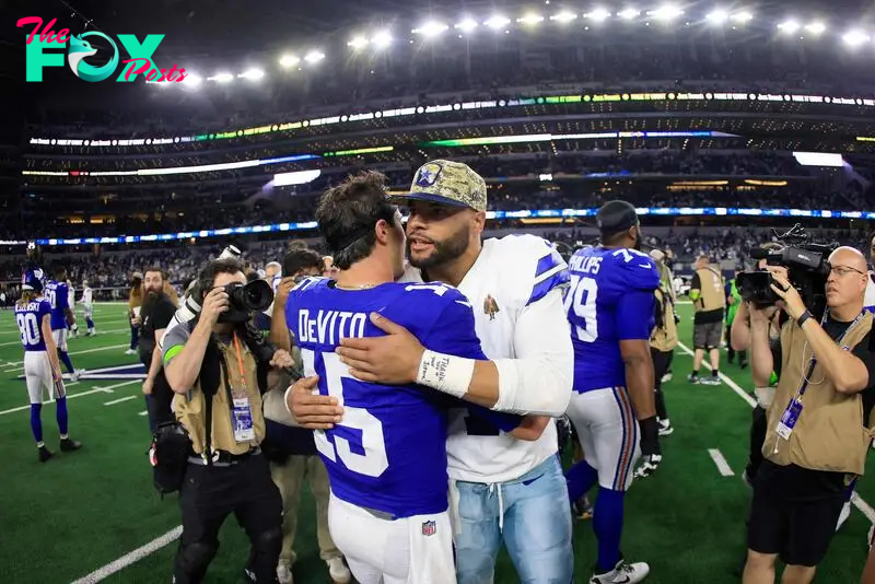 Dak Prescott of the Dallas Cowboys hugs Tommy DeVito of the New York Giants: November 12, 2023