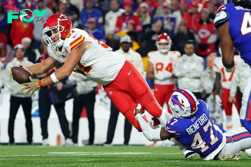 Travis Kelce #87 of the Kansas City Chiefs makes a catch against Christian Benford #47 of the Buffalo Bills during the third quarter at Highmark Stadium on November 17, 2024 in Orchard Park, New York.  
