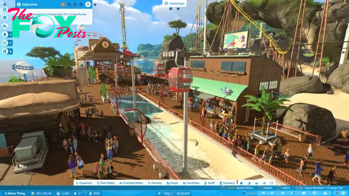 Planet Coaster 2 screenshot showing park guests roaming a beachside promenade in Career mode.