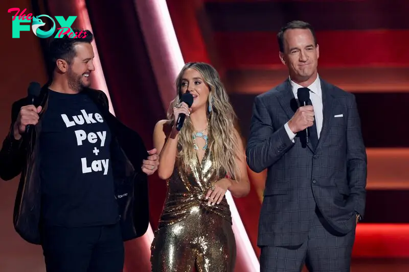 Luke Bryan, Lainey Wilson and Peyton Manning speak on the stage at the 58th Annual CMA Awards, in Nashville, Tennessee, U.S., November 20, 2024. REUTERS/Seth Herald