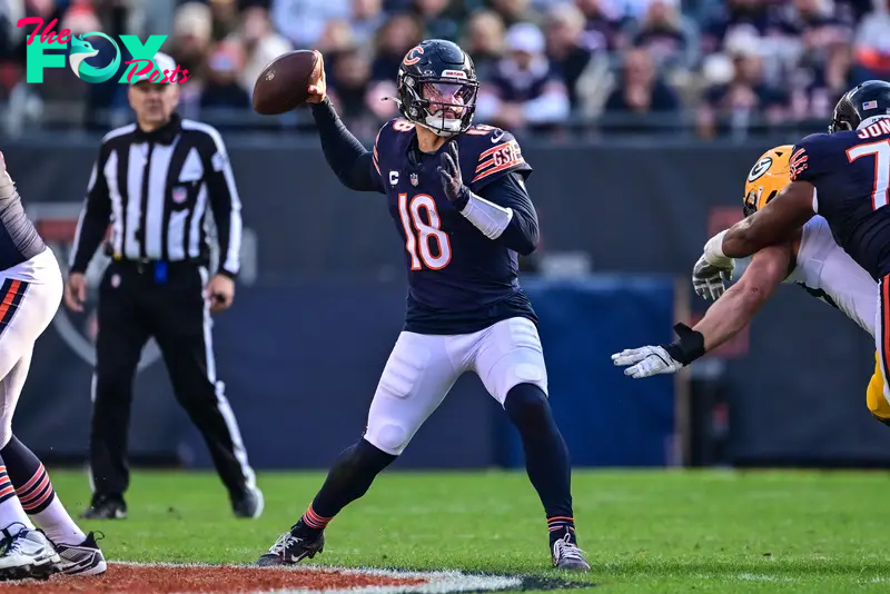 Nov 17, 2024; Chicago, Illinois, USA; Chicago Bears quarterback Caleb Williams (18) passes the ball against the Green Bay Packers during the third quarter at Soldier Field. Mandatory Credit: Daniel Bartel-Imagn Images