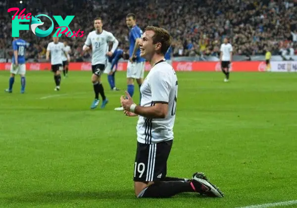 Germany¬ís Mario Goetze celebrates after scoring his side's second goal during a friendly soccer match between Germany and Italy at the Allianz Arena in Munich, southern Germany, Tuesday, March 29, 2016. (AP Photo/Kerstin Joensson)