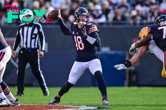 Nov 17, 2024; Chicago, Illinois, USA; Chicago Bears quarterback Caleb Williams (18) passes the ball against the Green Bay Packers during the third quarter at Soldier Field. Mandatory Credit: Daniel Bartel-Imagn Images