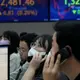 Asian stocks mixed after Wall St falls, China retail slows