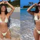 Kim Kardashian sends temperatures soaring as she writhes around in tiny ʙικιɴι