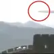 Large, Long Tubular Craft Slowly Gliding Over China’s Great Wall