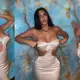 Sєxy Kim Kardashian flaunts her voluptuous figure in a strapless-backless satin gown