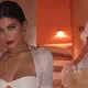 Kylie Jenner shows off long legs in shorts & leather trench coat during rare date night out with baby daddy Travis Scott