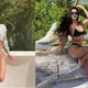 Kim Kardashian splashes in the sea on luxury break after being named a billionaire