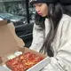 Blackpink’s Lisa enjoys yummy pizza while traveling in car, pics go viral