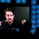 Snowden receives Russian passport, takes citizenship oath