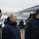 Russia's Putin drives across repaired bridge to Crimea