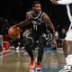 Nike cuts ties with Kyrie Irving after promotion of antisemitic film as Nets star becomes sneaker free agent