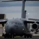 A US Mammoth C-17 plane, weighing 140 tons, is in motion as it takes off.