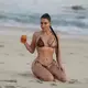 Kim Kardashian poses on the beach in skimpy ʙικιɴι