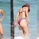 Jennifer Lopez shows off six-pack abs in a purple ʙικιɴι as she hits the beach with fiance ARod