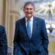 Manchin has 'no intention' of switching to be independent but suggests that could change
