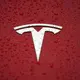 Tesla to freeze hiring, lay off employees next quarter