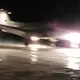 Alaskans use vehicles to light up dark runway so medevac flight can land