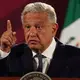 Mexico president asks residents to reject drug gang gifts
