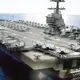 The most technologically advanced warship ever built, the new $13 billion aircraft carrier for the US Navy, is here to meet you