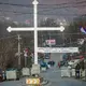 Kosovo reopens Serbia border crossing, roadblocks yet to go