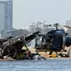 Helicopters collide over Australian beach, 4 passengers dead