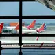 Indian held for unruly behavior with woman on airline flight