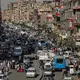 Egypt's inflation surges on amid currency's dramatic slide
