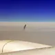 Mysterious Unidentified Object Was Seen Right Above The Clouds And Freaked Out Airline Passengers