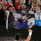 Novak Djokovic gets warm Australian Open welcome, then wins