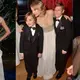 Taylor Swift has real-life princess moment in stunning gold and white gown as she heads up the stars at the Winter Whites