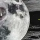 A huge 'Alien Ship' has been discovered lurking in the shadow of a crater on the Moon