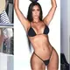 Not quite keeping up with Kim! Kendall Jenner flashes her perfectly pert derrière in skimpy yellow thong ʙικιɴι