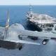 The Reason Behind the US Landing the Biggest Aircraft on an Aircraft Carrier in the Middle of the Sea