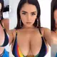 Demi Rose struggles to contain her ample ᴀssets in very skimpy rainbow string ʙικιɴι on sunshine break