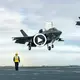 The Military F-35B suddenly transforms to helicopter mode during full throttle takeoff