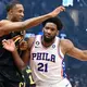 Joel Embiid boosts MVP case, but Cavs coach blasts overturned call that kept 76ers star on the floor