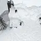 Record snowfall buries California mountain town
