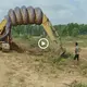 The incredible strength of a giant 20-foot python was captured in the moment it wrapped around an excavator (VIDEO)
