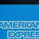 AmEx profits fall as higher spending offset by loan losses