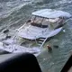 2 people, dog rescued from sinking boat off Georgia coast