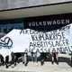 Topless protester briefly disrupts VW annual meeting