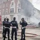 Vehicle explodes in central Milan, releasing plumes of smoke