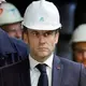 Macron vows to build back factories, boost France's economy shaken by pension protests
